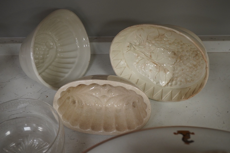 A 19th century tureen, ceramic jelly moulds and a set of glass rinsers, largest 39cm wide